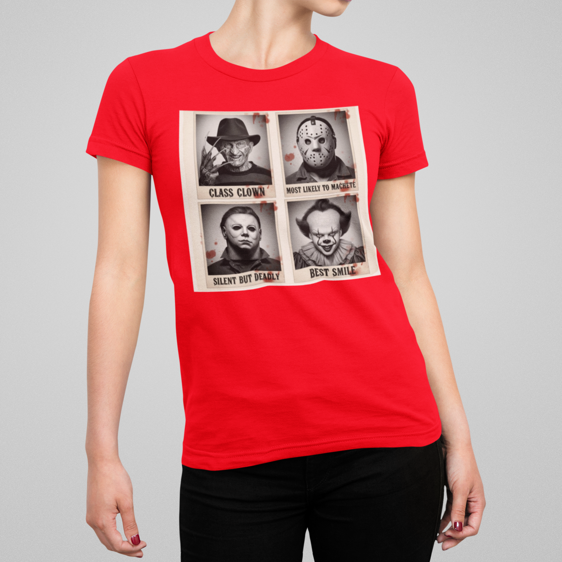 A person wearing a Red T-shirt with horror icons yearbook design featuring slasher villains and funny captions.